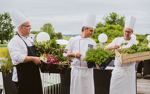 Reiters Hotels - kitchen chefs with fresh herbs